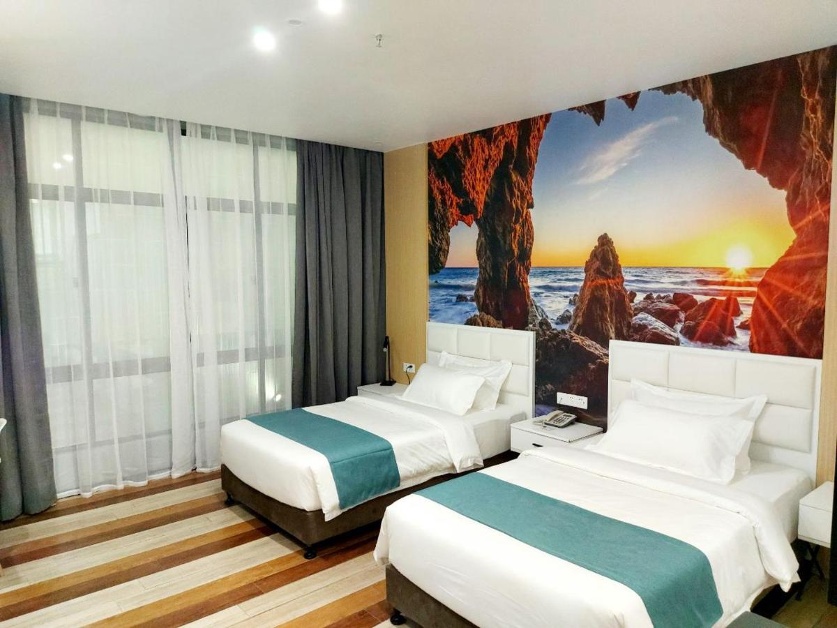 Fan'S Hotel Baybay Esterno foto