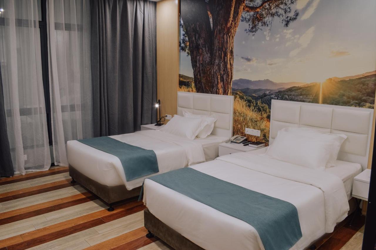 Fan'S Hotel Baybay Esterno foto